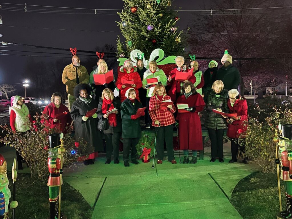 The North Brunswick Woman's Club sing Christmas carols at the beginning of the Annual Tree Lighting Ceremony.